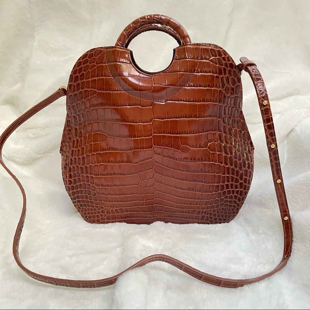 Complét Brown bag in crocodile print leather